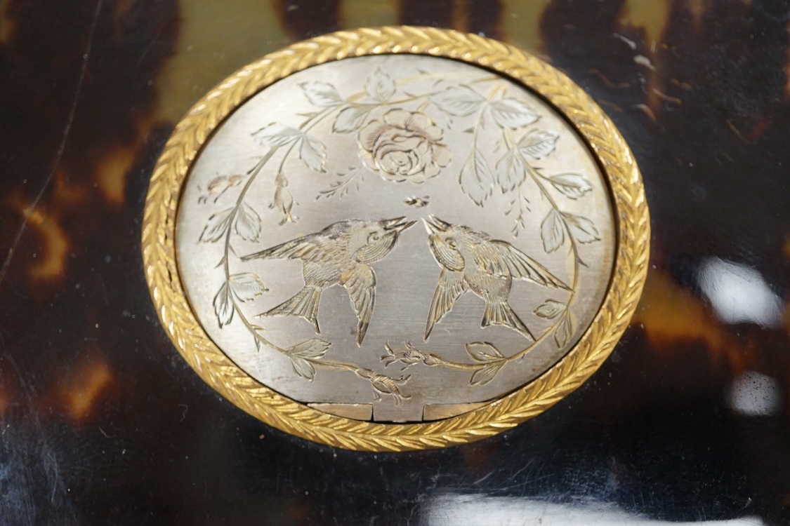 A Victorian white and yellow mounted singing automaton bird music box, damaged, with case and key